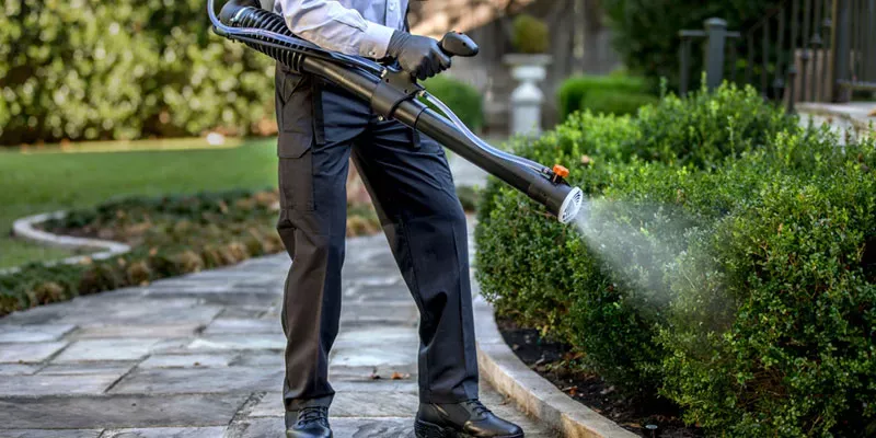 Terminix pest tech spraying for mosquitoes