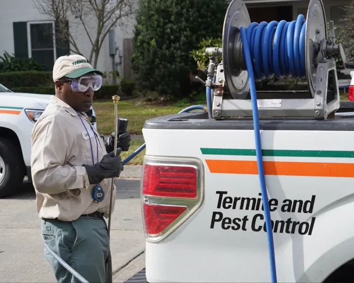 terminix tech next to truck