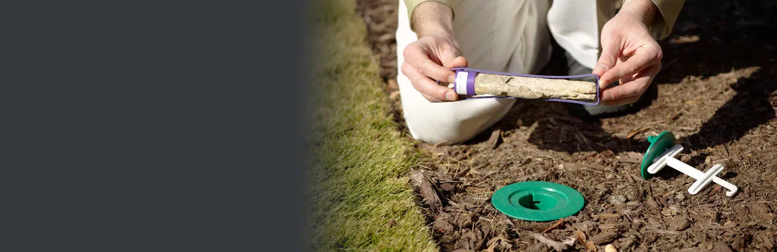 Tech checking sentricon bait system, termites in new orleans