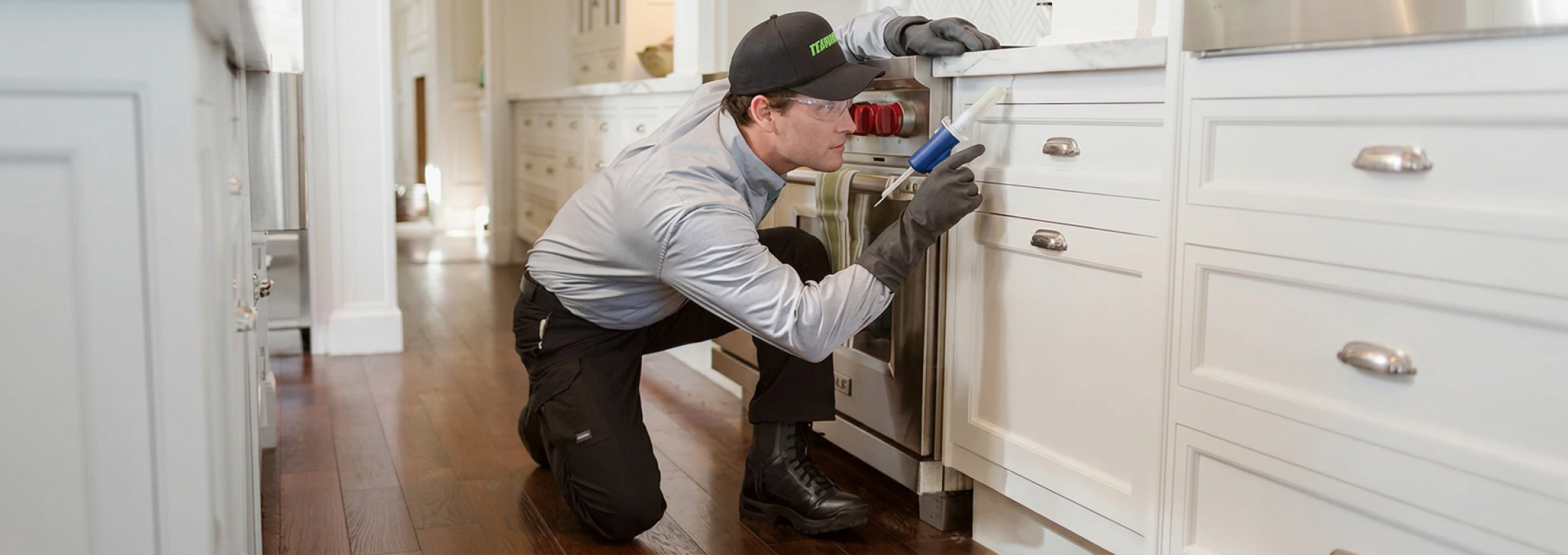 tech-looking-under-sink